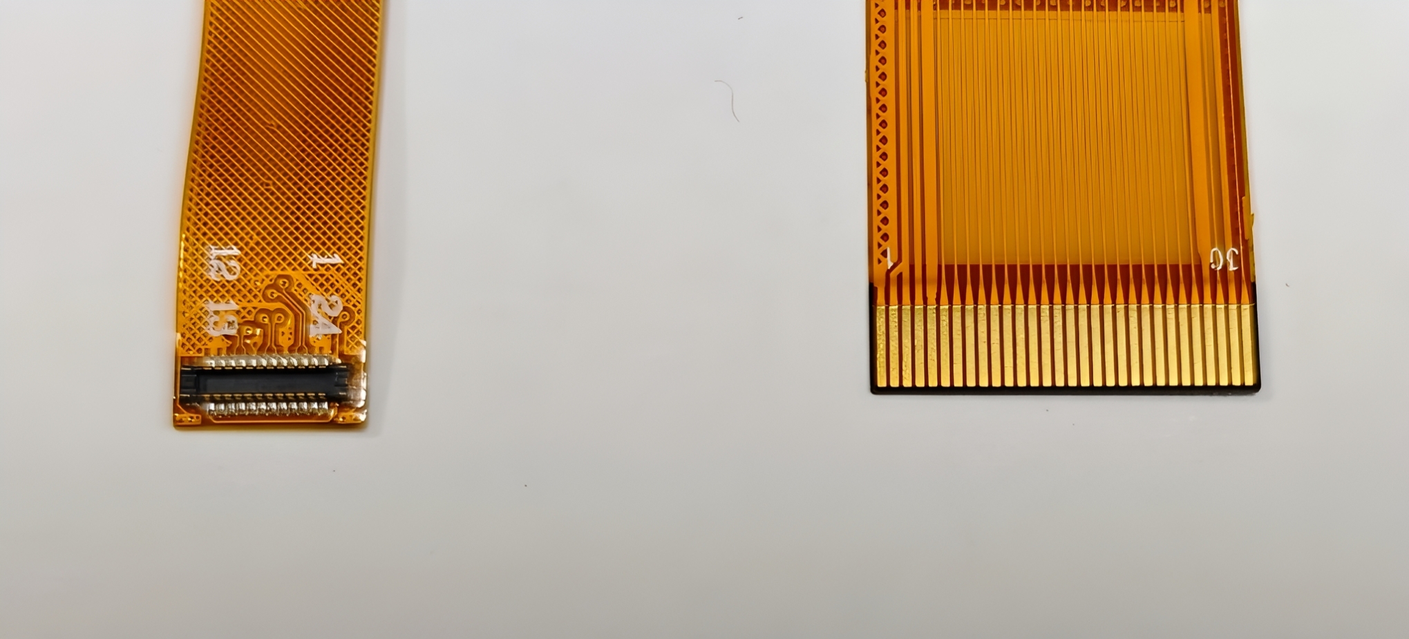 Is it better to use a B TO B connector or a gold-finger plug for flexible display cables?